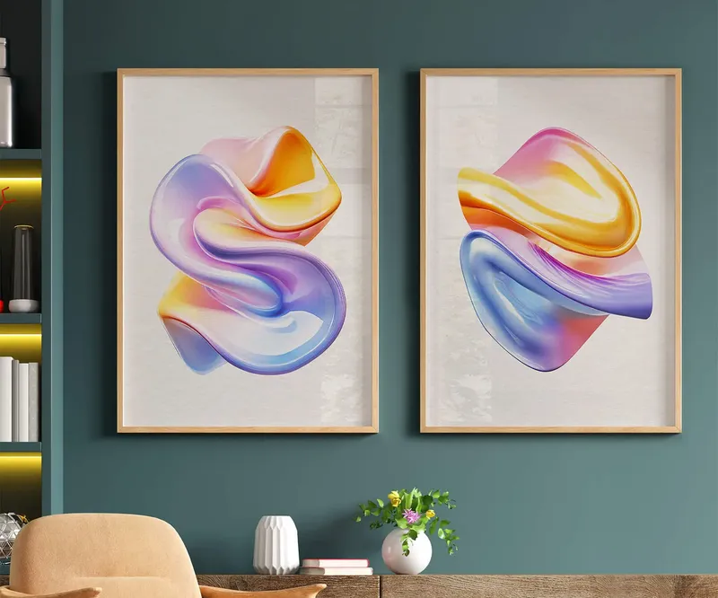 Framed art prints hanging on a teal living-room wall