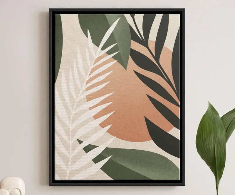 Gallery-wrapped canvas in a black float frame above a sideboard